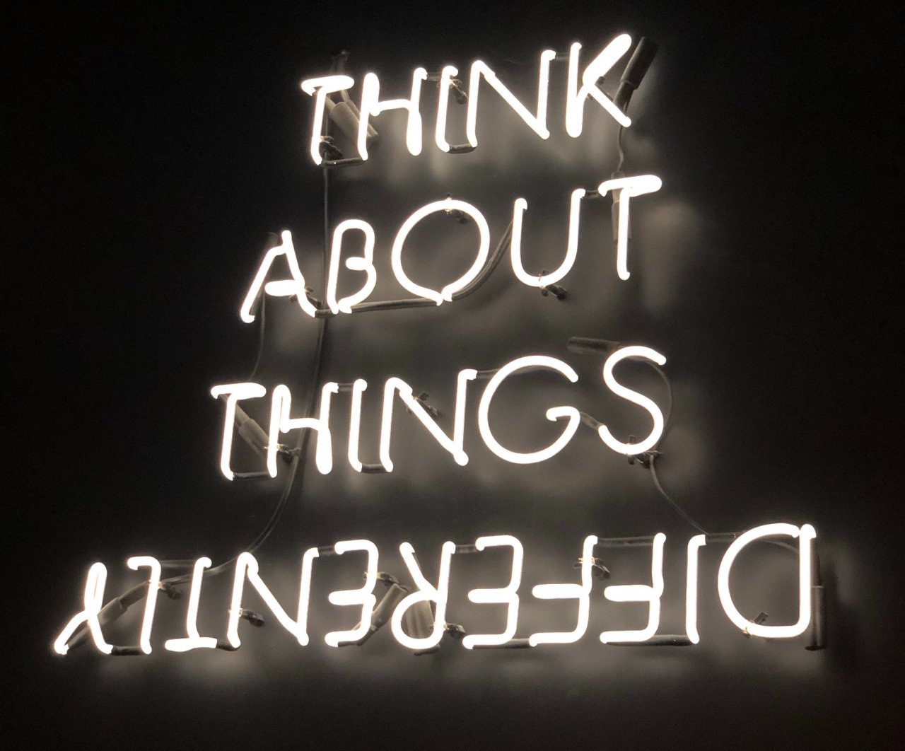 Think about things differently neon sign
